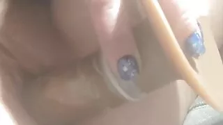 MILF masturbating on deck