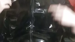 Spandex Hood wearing boy having fun in pvc suit