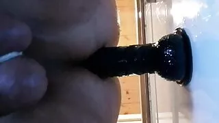 Masturbation with a dildo