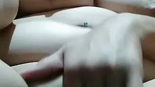 Playing with her big fat nipples