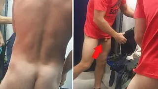 a beautiful man in the locker room of a store