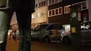 Jeanspiss on busy street after Party