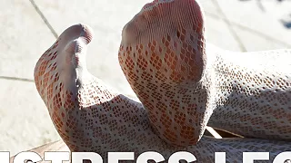Sexy Feet In White Fishnet Pantyhose Outdoor