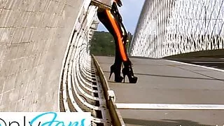 Backstage from photoshoot - black and orange latex in public