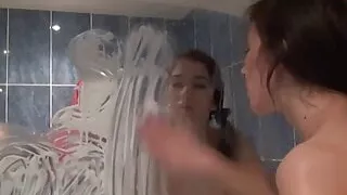 Petite teen masturbates using a wine glass