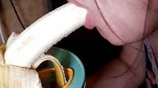 Sucking a banana in my wet mouth
