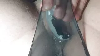 Speculum in pussy through black transparent panties