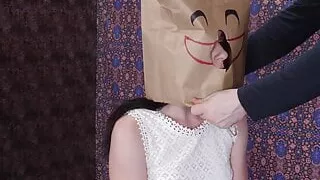 Bag headed submissive teen sucking