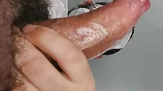 Jerking my big uncut curved cock and shooting a huge load