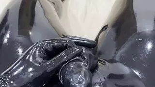 Horny rubberdrone second cum in rubber cock sheath