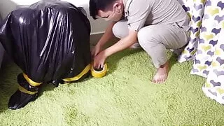 Fejira com – Zentai girl was put into a plastic bag