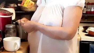 Mature woman in transparent granny night gown, natural tits