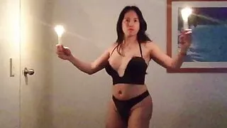 hot shemale doing her candle sexy dance and boobs out