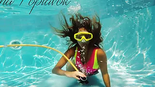 Hottest babe Irina Poplavok is naughty in the pool