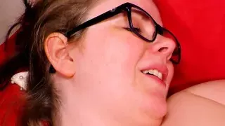 BBW woman with glasses sucking a hard prick