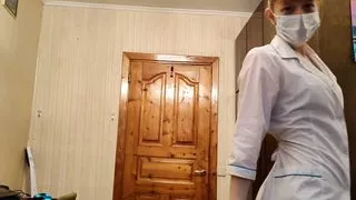 Anxious nurse treating a sick person