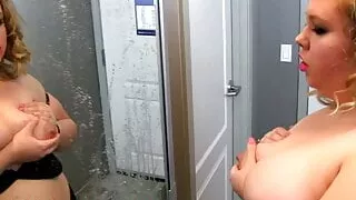 Big milk filled boobs spraying a mirror