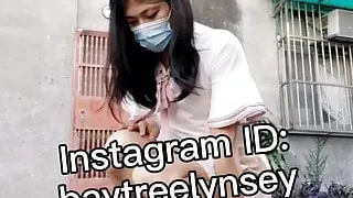 Tgirl peeing on the road