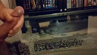 Blowing my load onto the glass table