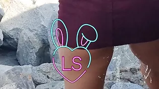 Horny girl gets naughty and squirts all over the beach