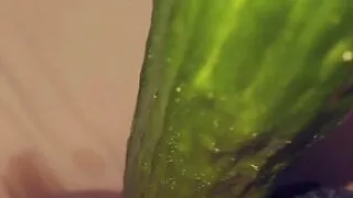 Swiss girl fucks herself with a cucumber