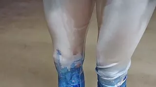 Piss in shiny leggings