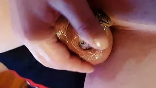 Sissy Christina shows her tiny shield chastity cage