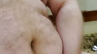 Playing with my toy while being in a hotel bathroom