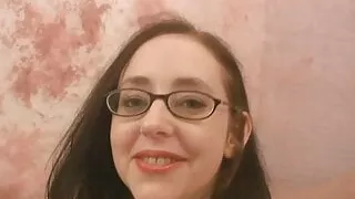 Tattooed brunette Audrey Alder fucks a cock with her mouth