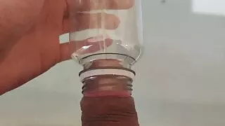 Amateur pissing in a bottle