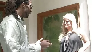 Blonde babe getting banged hard by black stud on the couch