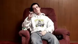 Athletic amateur Brian Strowkes smokes cigars while jerking