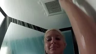 Hot big titty blonde takes a shower