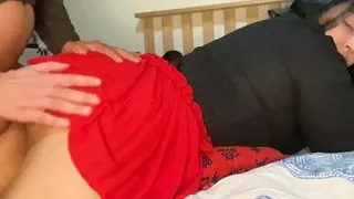 DELICIOUS BRUNETTE was reading with a red skirt teasing me!