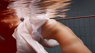 Big tits redhead Lola underwater nude