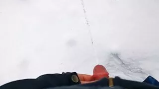 Boy pee in the snow