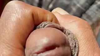 stroking cock on orange rug