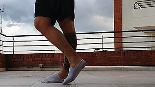 Latino shows his socks OUTDOOR ( Big feet)