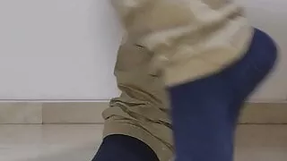 Dark blue socks on latino feet
