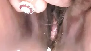 Mature Latina with hairy pussy pissing in beautiful bathroom