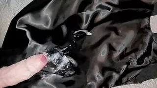 Making a mess all over the satin lining of a black dress