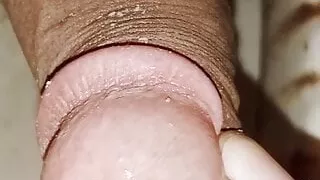 Indian boy long peeing with closeup uncut cock