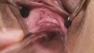 Teen Japanese opens up her pussy with tool