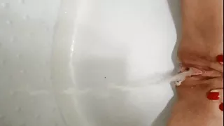 Hot Russian milf pissing in the shower