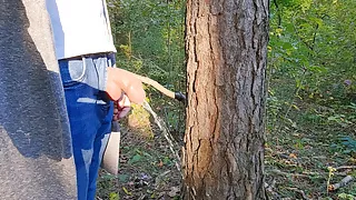 Pissing boy - uncircumcised cock in forest