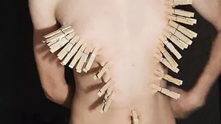 Masturbating with clothespins
