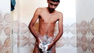 Rajesh showering in bathroom, masturbating dick and cumming