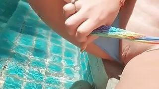 Hot pussy touching near the pool – close-up