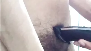 Twink shaves his hard cock alone in home