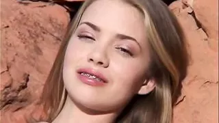 Little April with Natural tits Fingering Outdoors in the Rocks